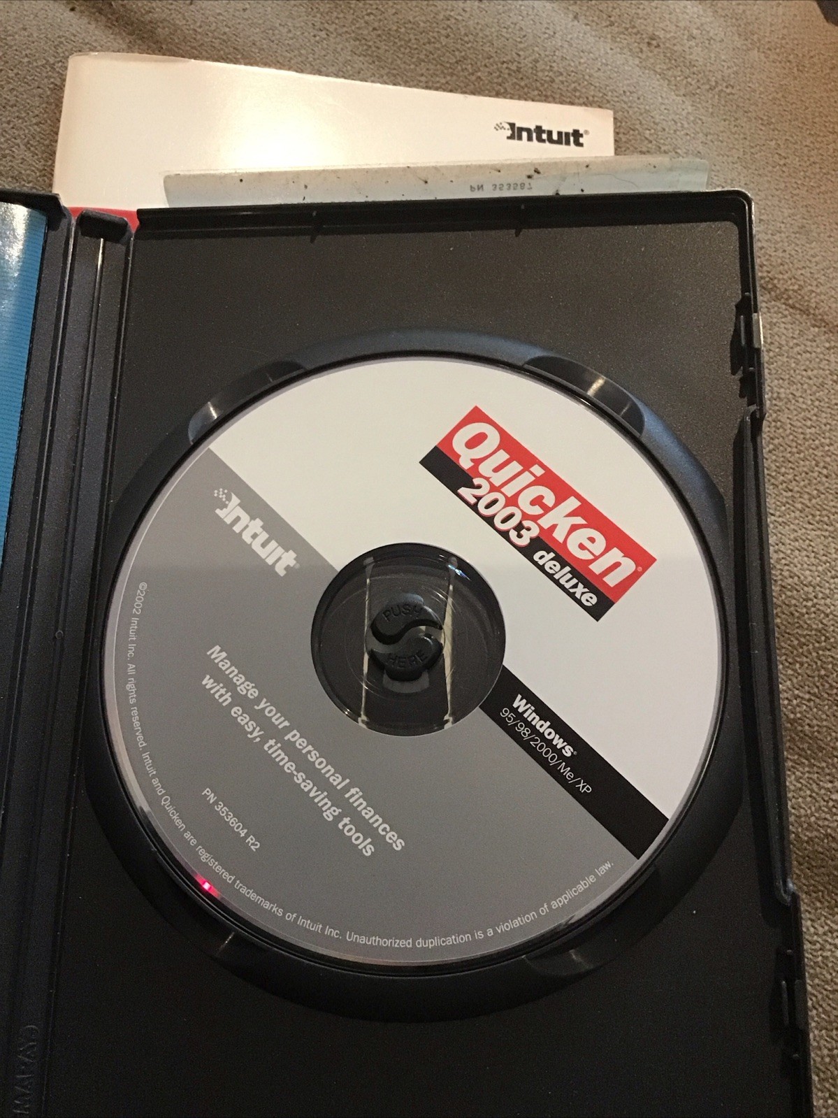 Quicken 2003 Deluxe software CD-ROM disc program Intuit Windows 95/98/2000/Me/XP
