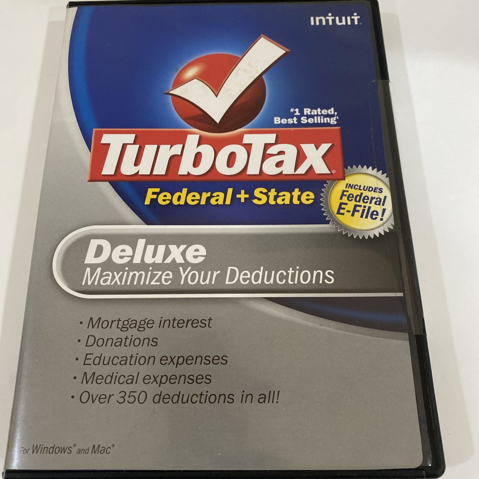 Turbo Tax Deluxe 2008 Federal + State includes Federal E-File cd used