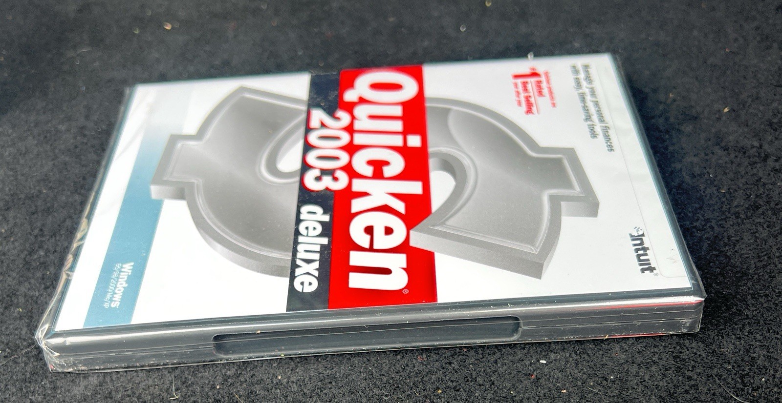 BRAND NEW FACTORY SEALED – Intuit Quicken 2003 Deluxe For Windows