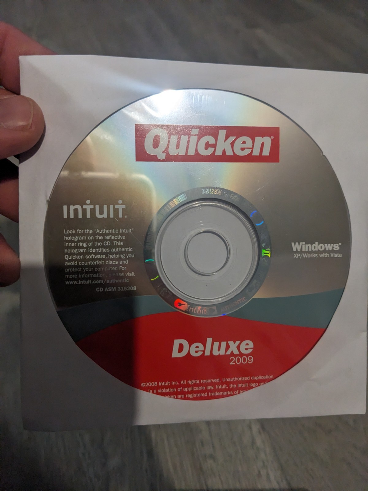 Quicken Deluxe 2009 (Windows XP Vista) DISC ONLY