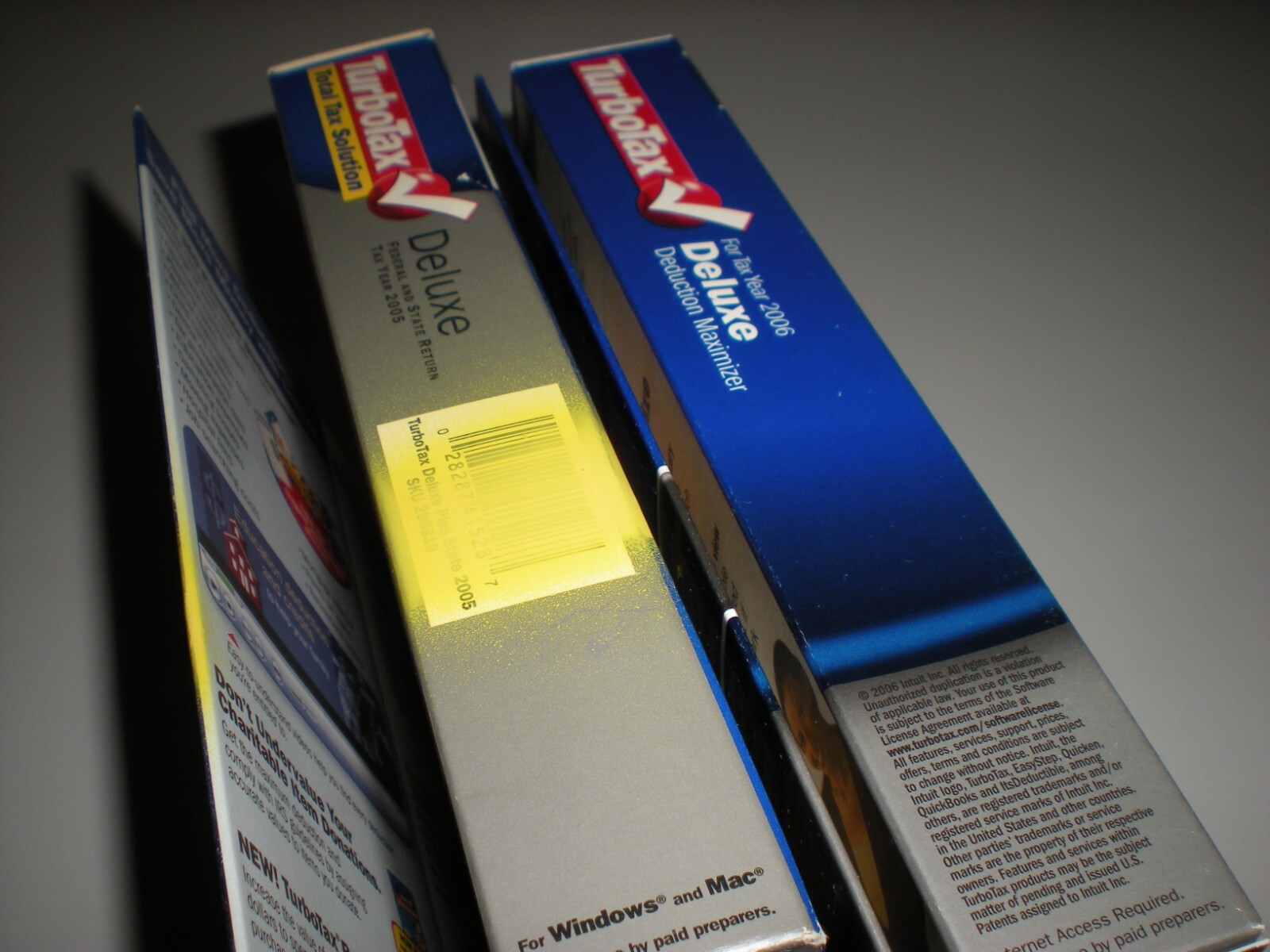 Turbotax 2005 & 2006 Deluxe with state. Turbo tax. New. 2005 package blemished.