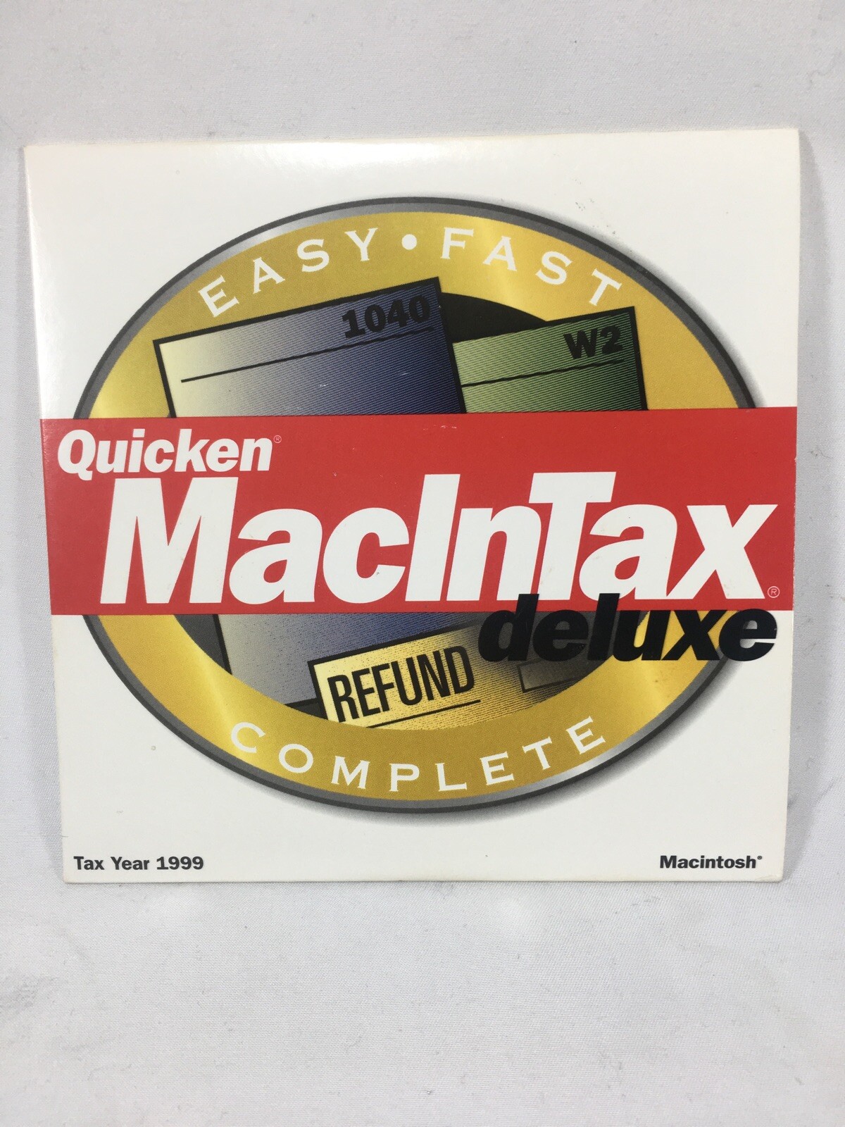 Used 1999 Quicken MacInTax Deluxe in orig sleeve. Complete Federal/State CD disc