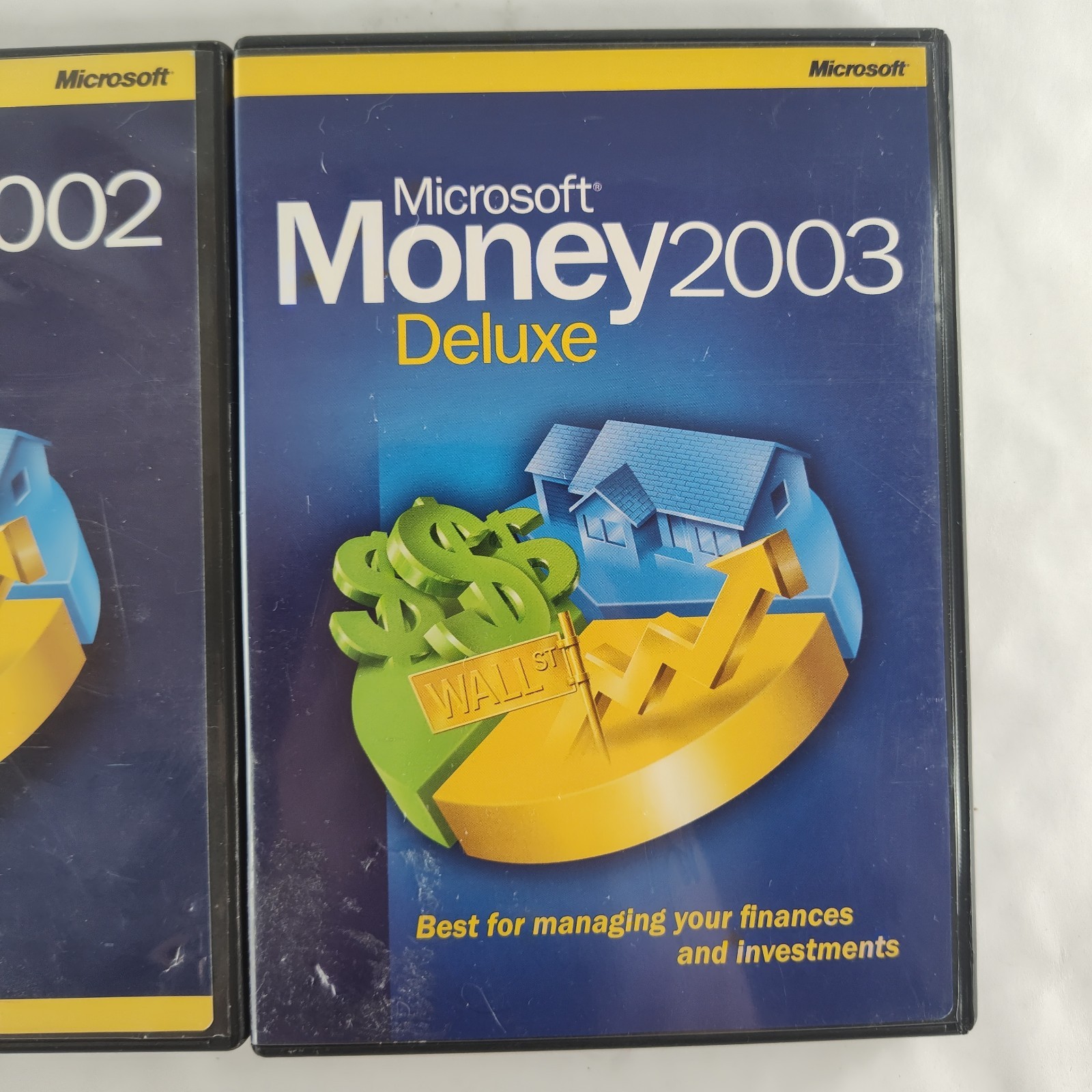 Microsoft Money 2002 Deluxe and Microsoft Money 2003 Deluxe for Windows