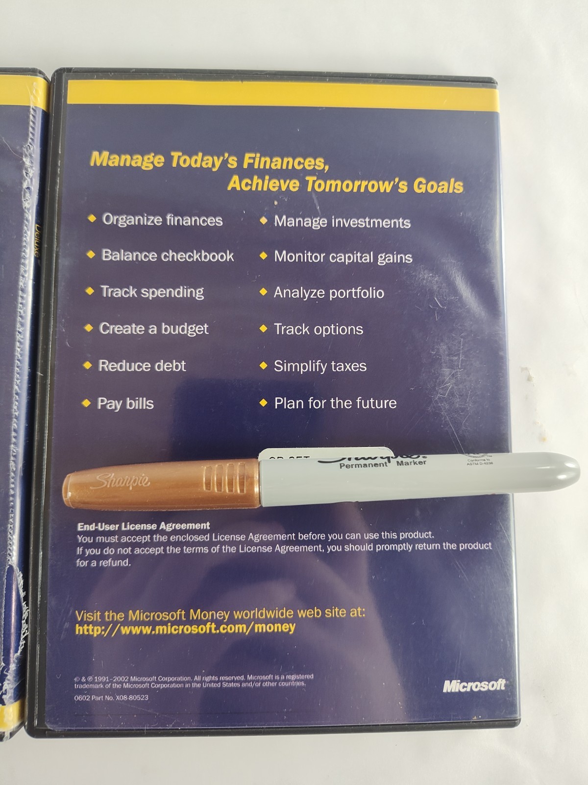 Microsoft Money 2002 Deluxe and Microsoft Money 2003 Deluxe for Windows