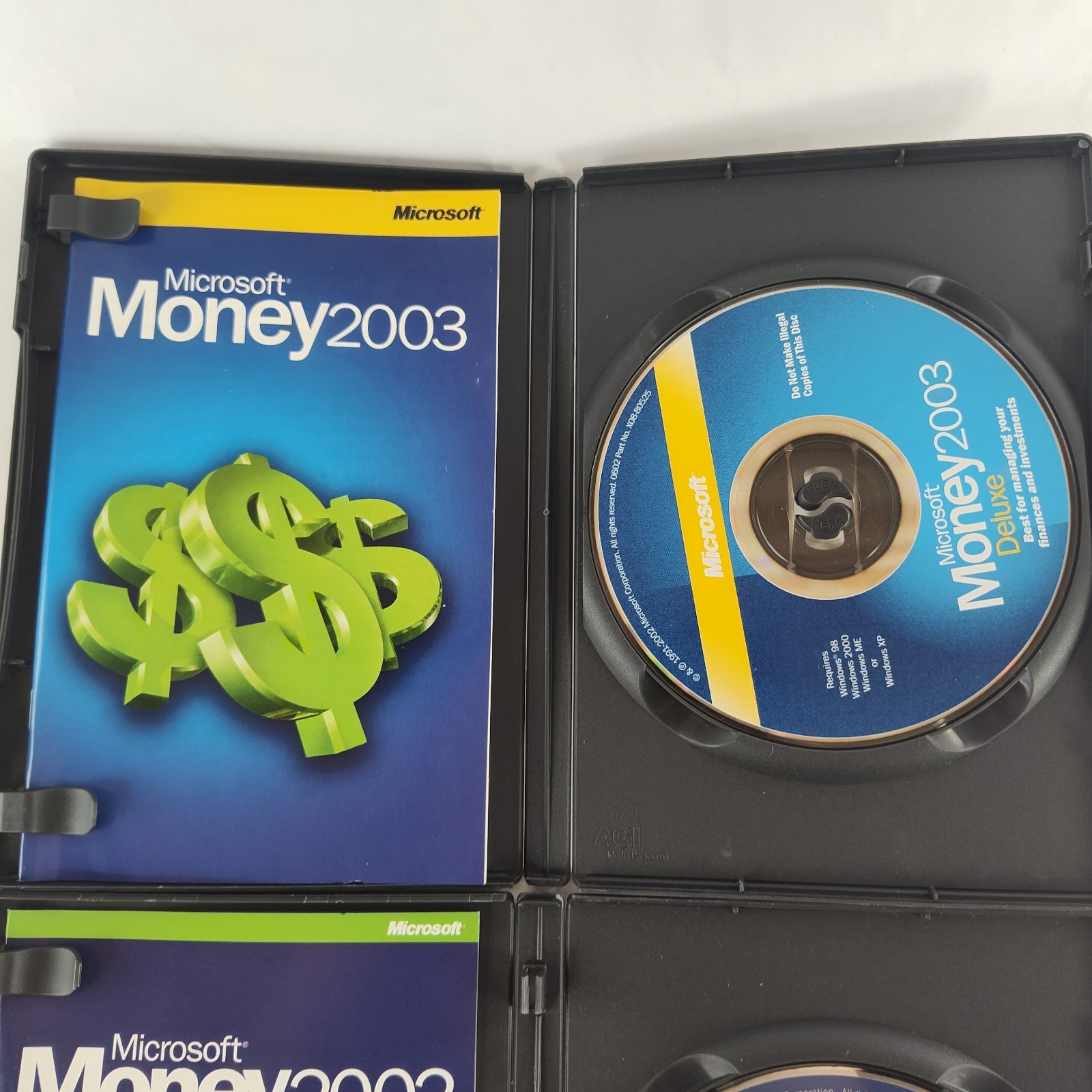 Microsoft Money 2002 Deluxe and Microsoft Money 2003 Deluxe for Windows
