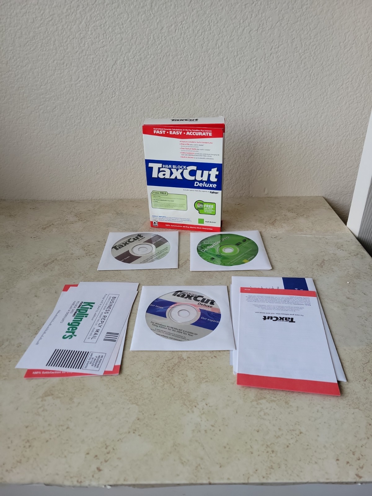H&R Block TaxCut 2004 Deluxe Tax Cut imports Turbotax. New in box