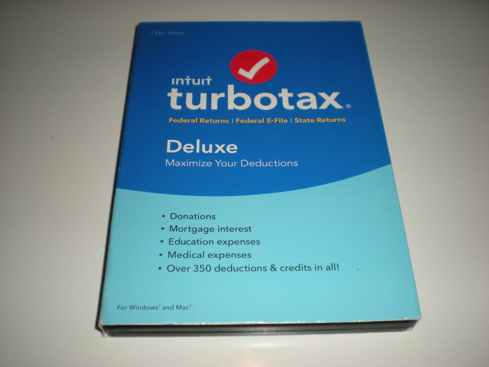 Turbotax 2018 Deluxe. Federal and State. New in sealed box.