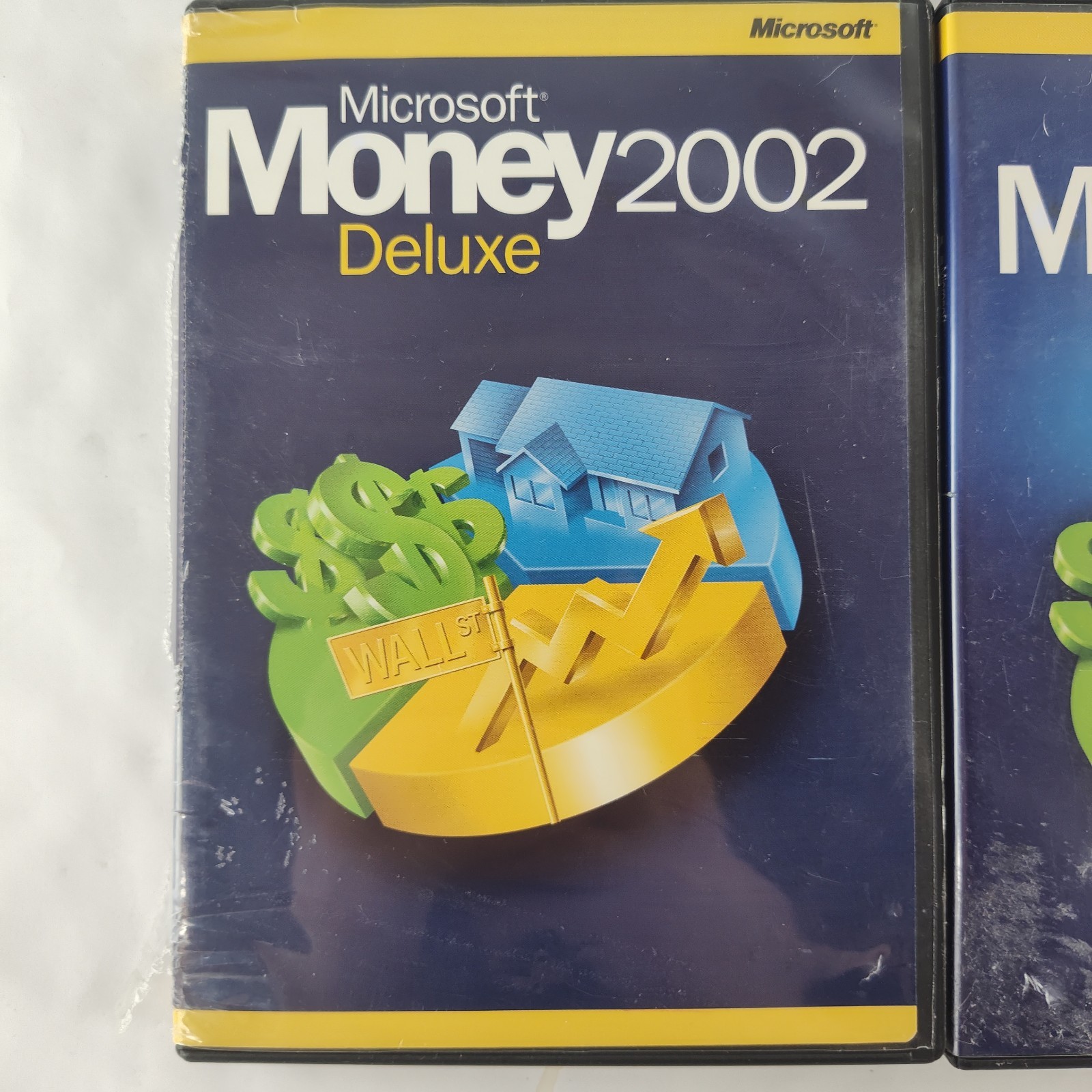 Microsoft Money 2002 Deluxe and Microsoft Money 2003 Deluxe for Windows