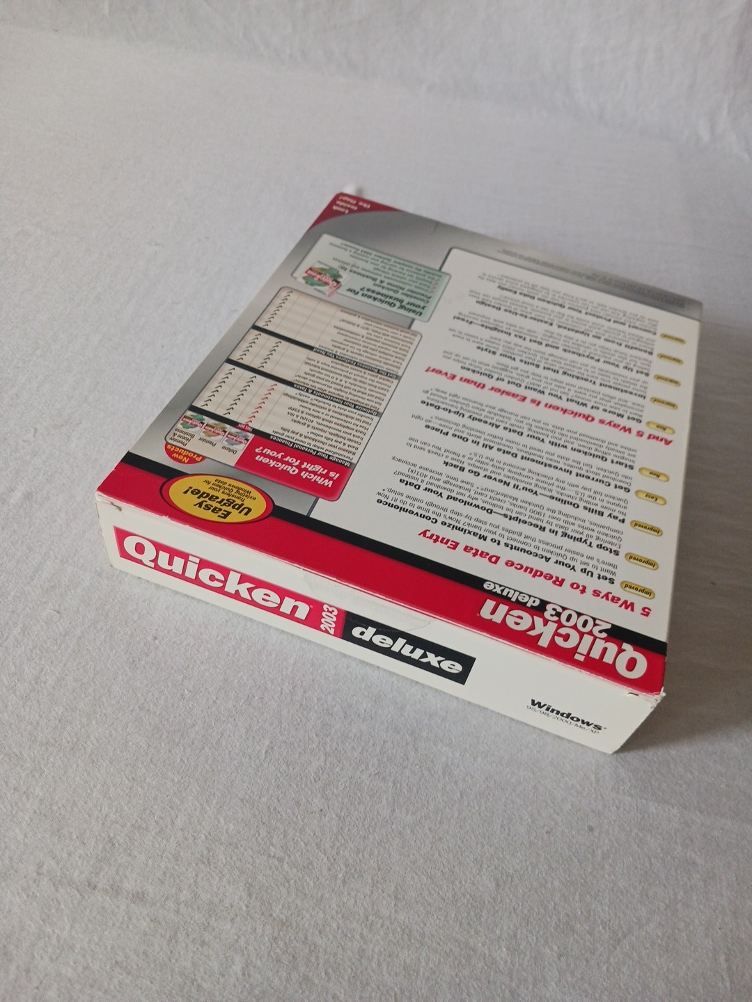 BRAND NEW FACTORY SEALED – Intuit Quicken 2003 Deluxe For Windows