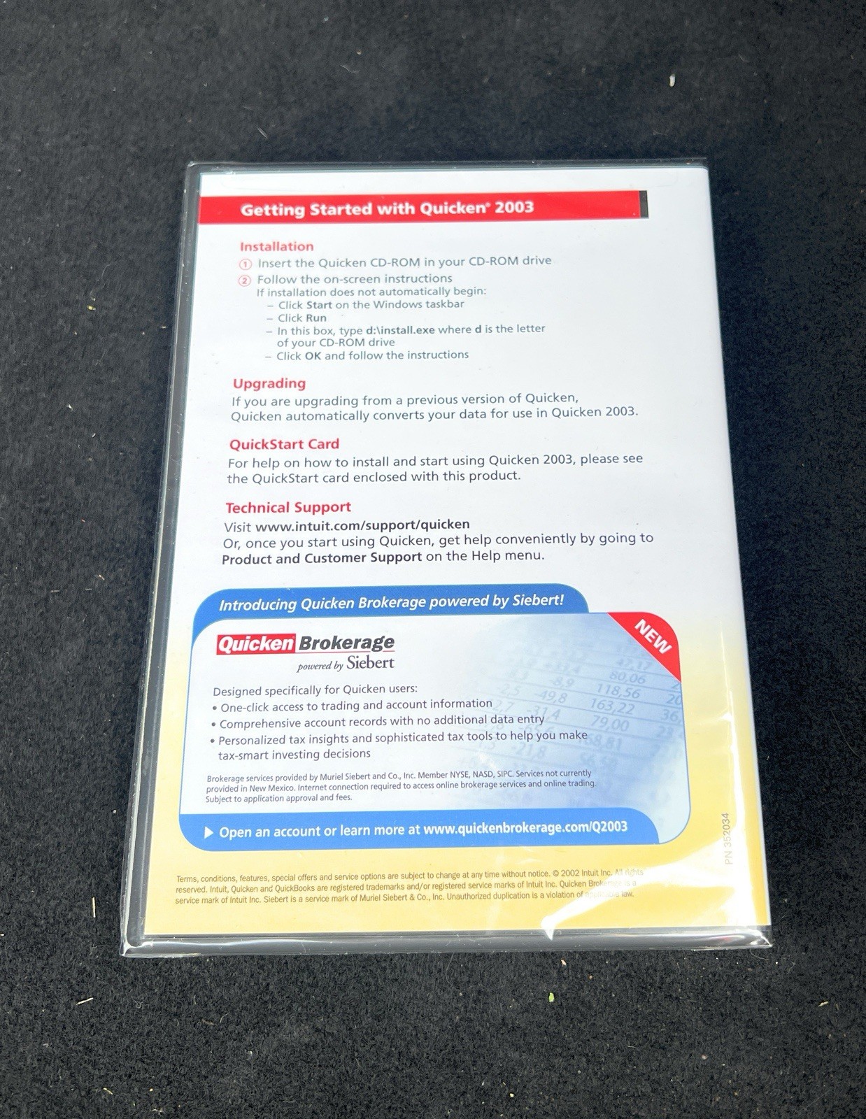 BRAND NEW FACTORY SEALED – Intuit Quicken 2003 Deluxe For Windows