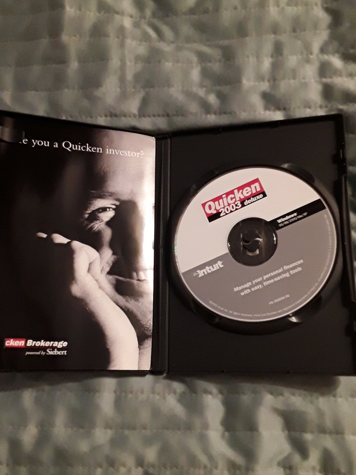 QIICKEN 2003 DELUXE CD ROM BY INTUIT